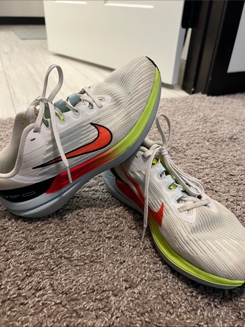Nike White Running Shoes with Red Swoosh and Neon Yellow Accents